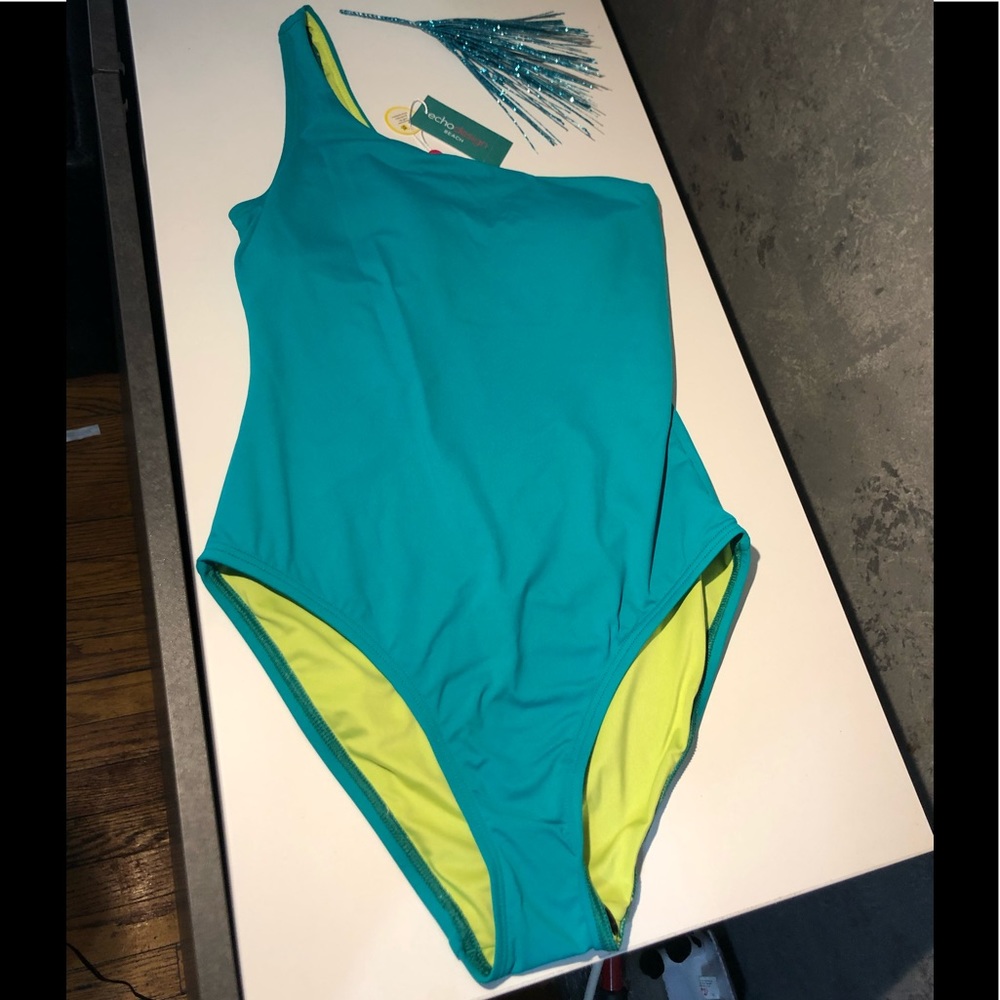 This teal beauty one strap is a must have!